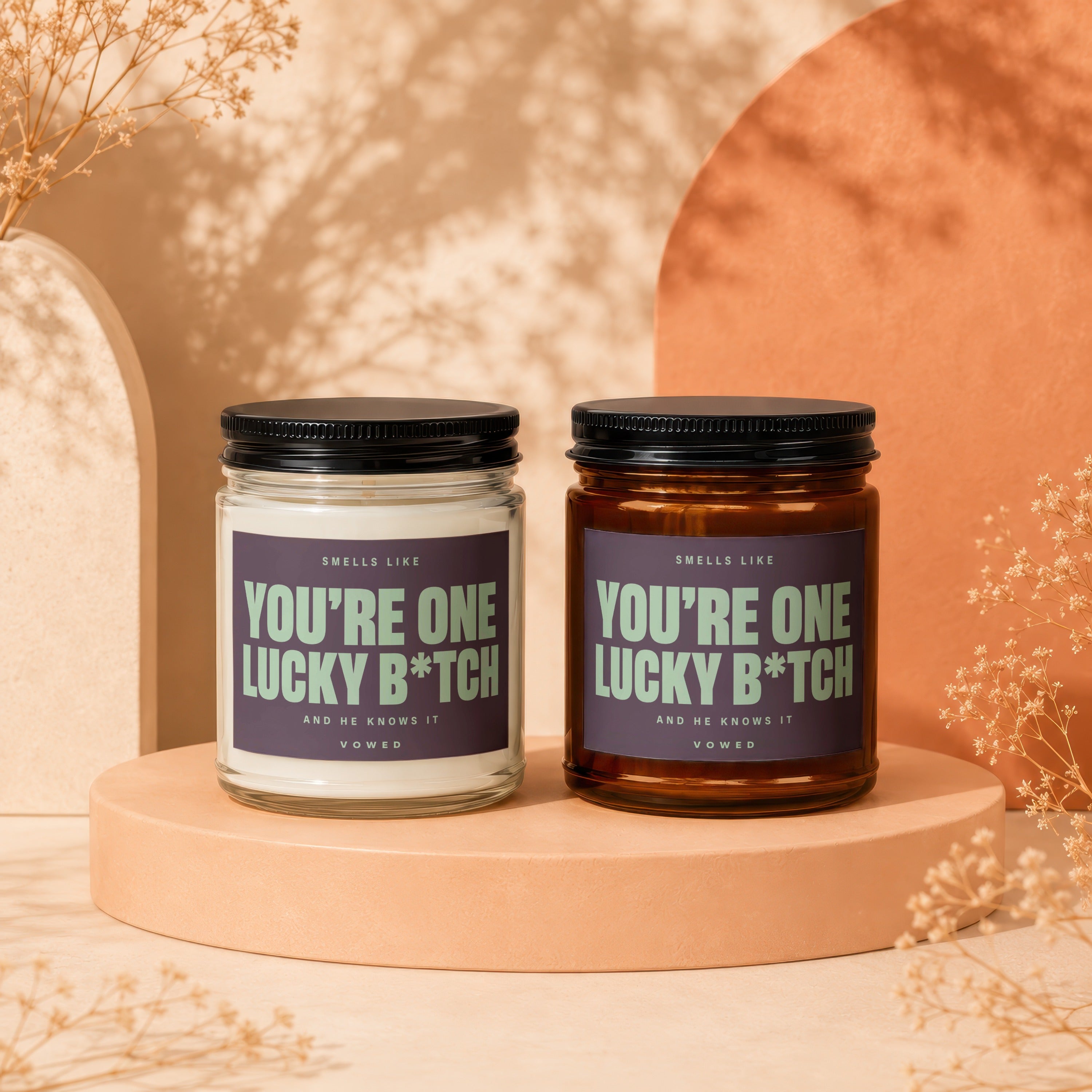 Two candles labeled "You're one lucky B*tch."