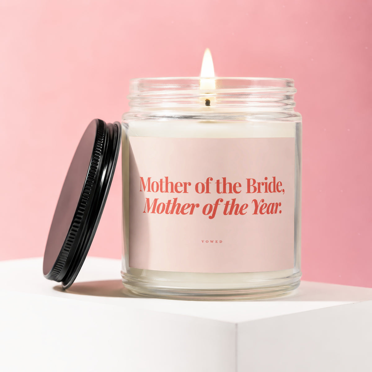 Candle with pink label reading "Mother of the Bride, Mother of the Year".