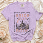 Purple t-shirt with "Bride Over Boos" graphic and text about being strong.