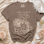 Brown t-shirt with "Mother of the Bride: Powered by love, running on caffeine, surviving on grace" text and graphics.