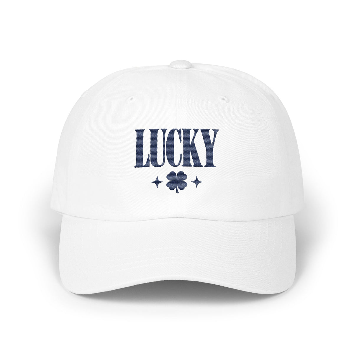 A white baseball cap featuring dark blue embroidered text reading "LUCKY" above a four-leaf clover.