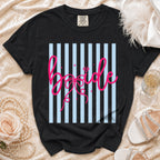 Black t-shirt with pink "bride" text and diamond graphic on striped background.