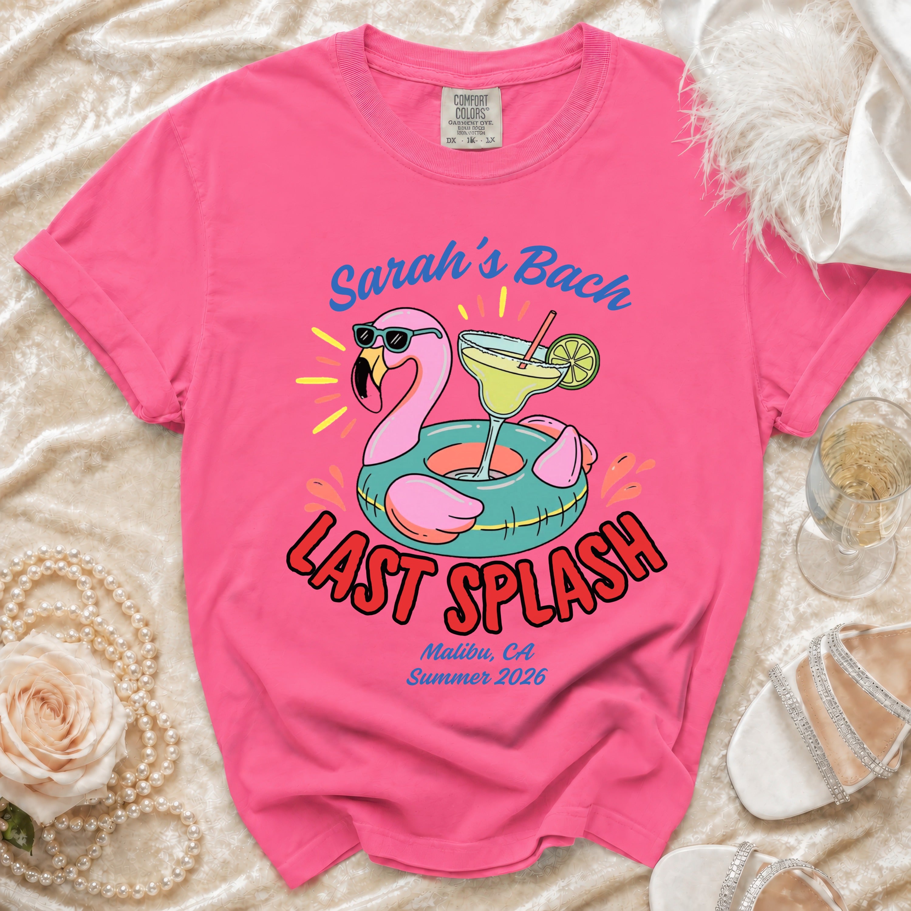 Pink t-shirt with "Sarah's Bach LAST SPLASH" text and flamingo graphic.