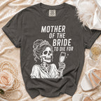 Dark grey t-shirt with "MOTHER OF THE BRIDE TO DIE FOR" and skeleton graphic.