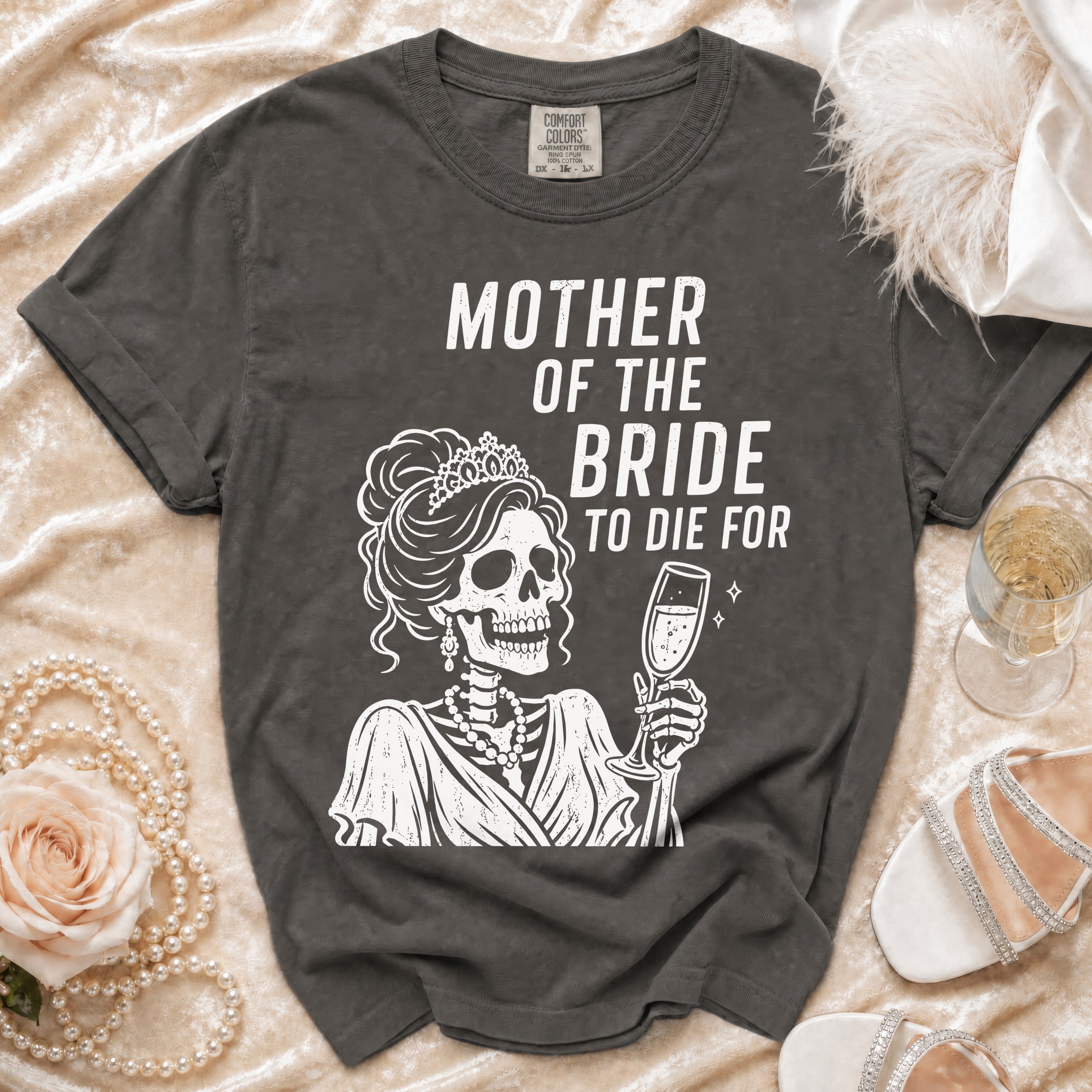 Dark grey t-shirt with "MOTHER OF THE BRIDE TO DIE FOR" and skeleton graphic.