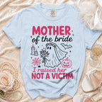 Light blue Comfort Colors t-shirt with "MOTHER of the bride" and ghost bride graphic.