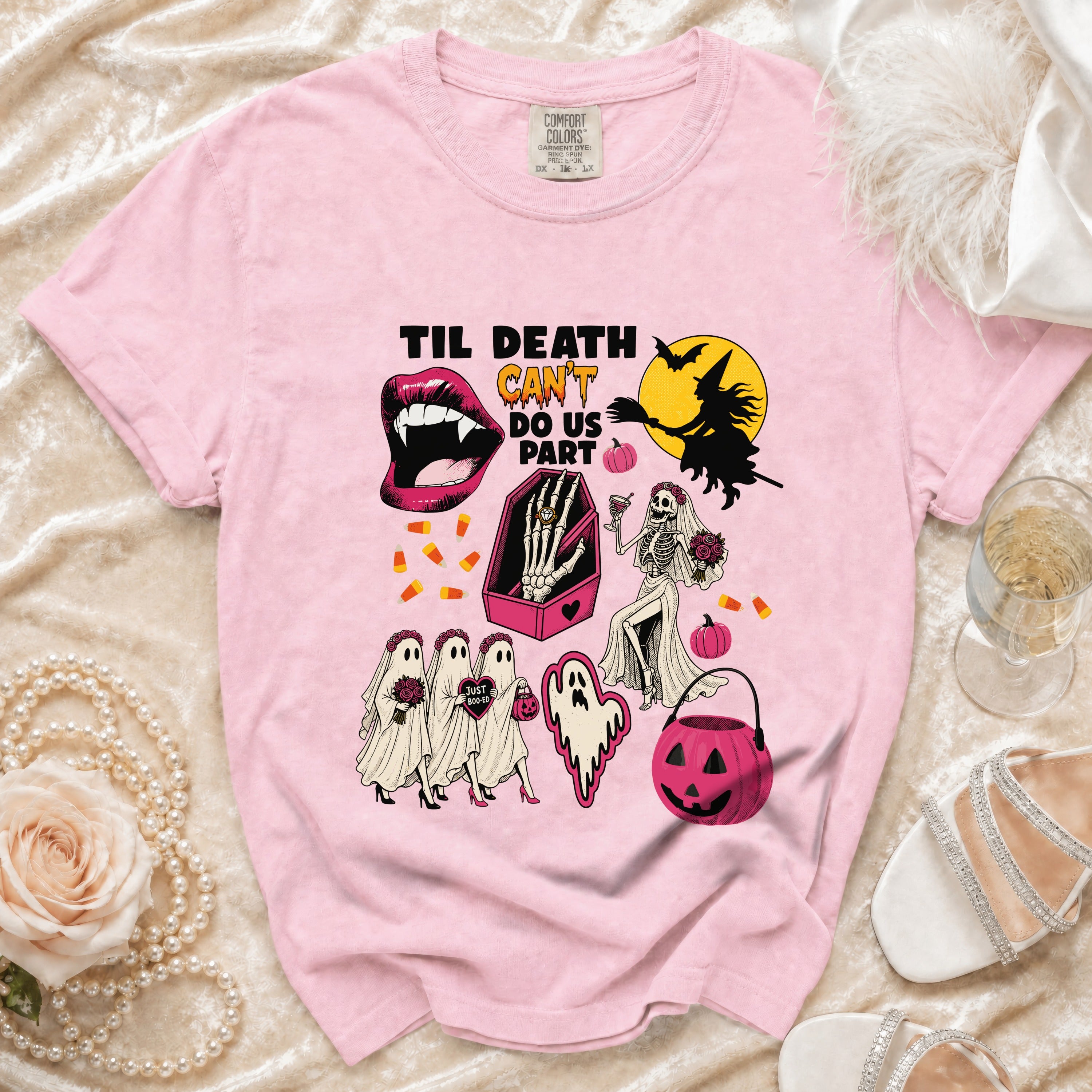 Pink t-shirt with "Til Death Can't Do Us Part" Halloween graphic.