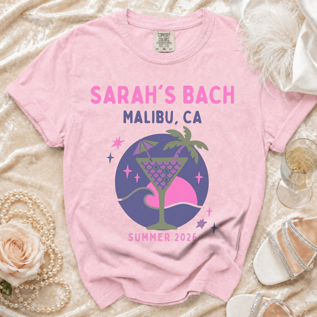 Pink t-shirt with "Sarah's Bach Malibu, CA Summer 2026" and cocktail graphic.