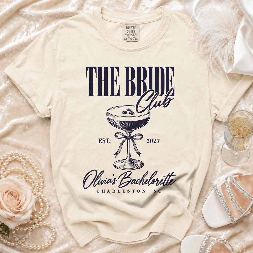 "The Bride Club" t-shirt with martini glass, est. 2027, Olivia's Bachelorette, Charleston SC.