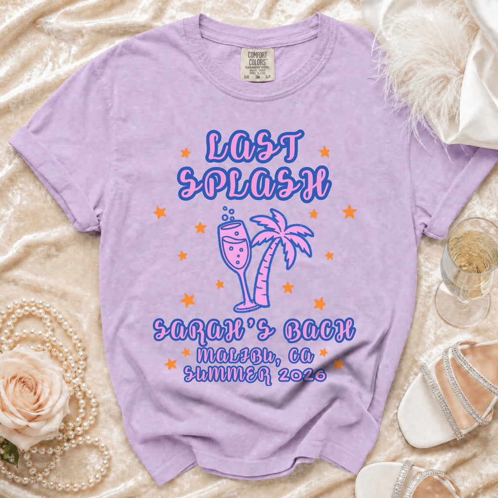 Purple t-shirt with "Last Splash" and palm tree graphic, Malibu, CA, Summer 2026.