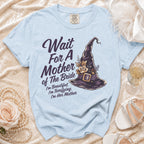 Light blue t-shirt with "Wait For A Mother of The Bride" and witch hat graphic.