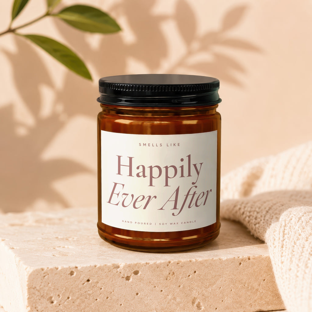 Amber glass candle with "Happily Ever After" label, hand-poured soy wax.