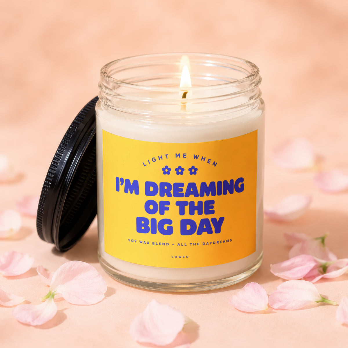 Candle with text "I'm Dreaming of the Big Day" and "Vowed" on label.