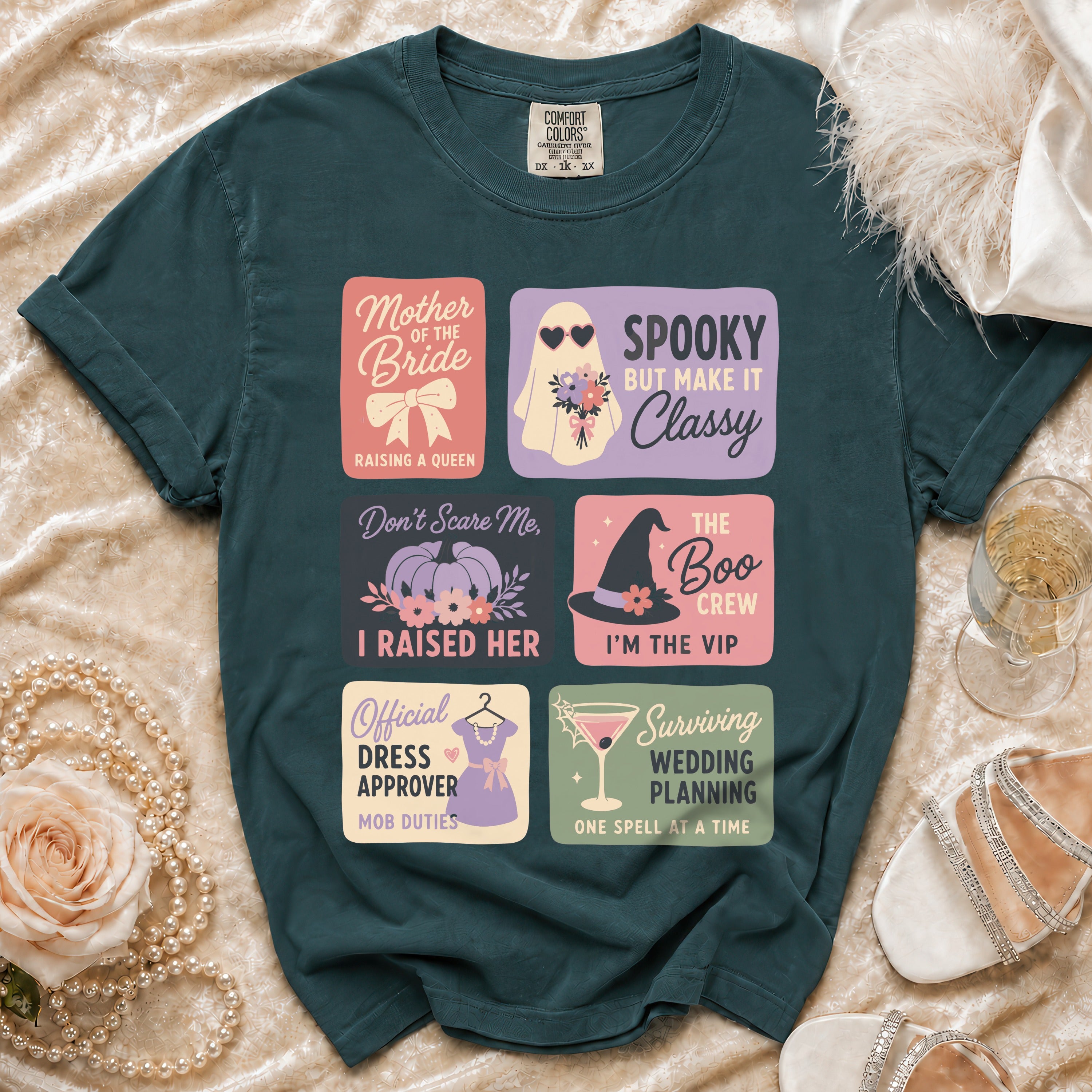 Teal t-shirt with six graphic panels featuring phrases like "Mother of the Bride" and "Spooky but make it Classy".
