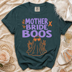 Teal t-shirt with "Mother of the Bride Boos" text and ghost graphic.