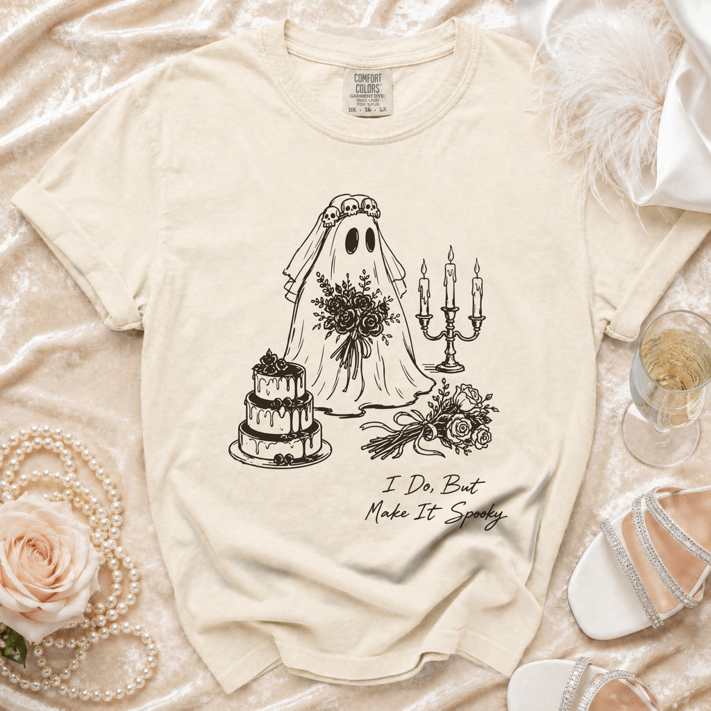 Ghost bride graphic with text "I Do, But Make It Spooky" on a cream t-shirt.