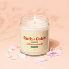 Candle with label "Ruth + Caleb still no refunds since 2009".