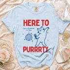 Light blue t-shirt with "HERE TO PURRRTY" text and a cat graphic.