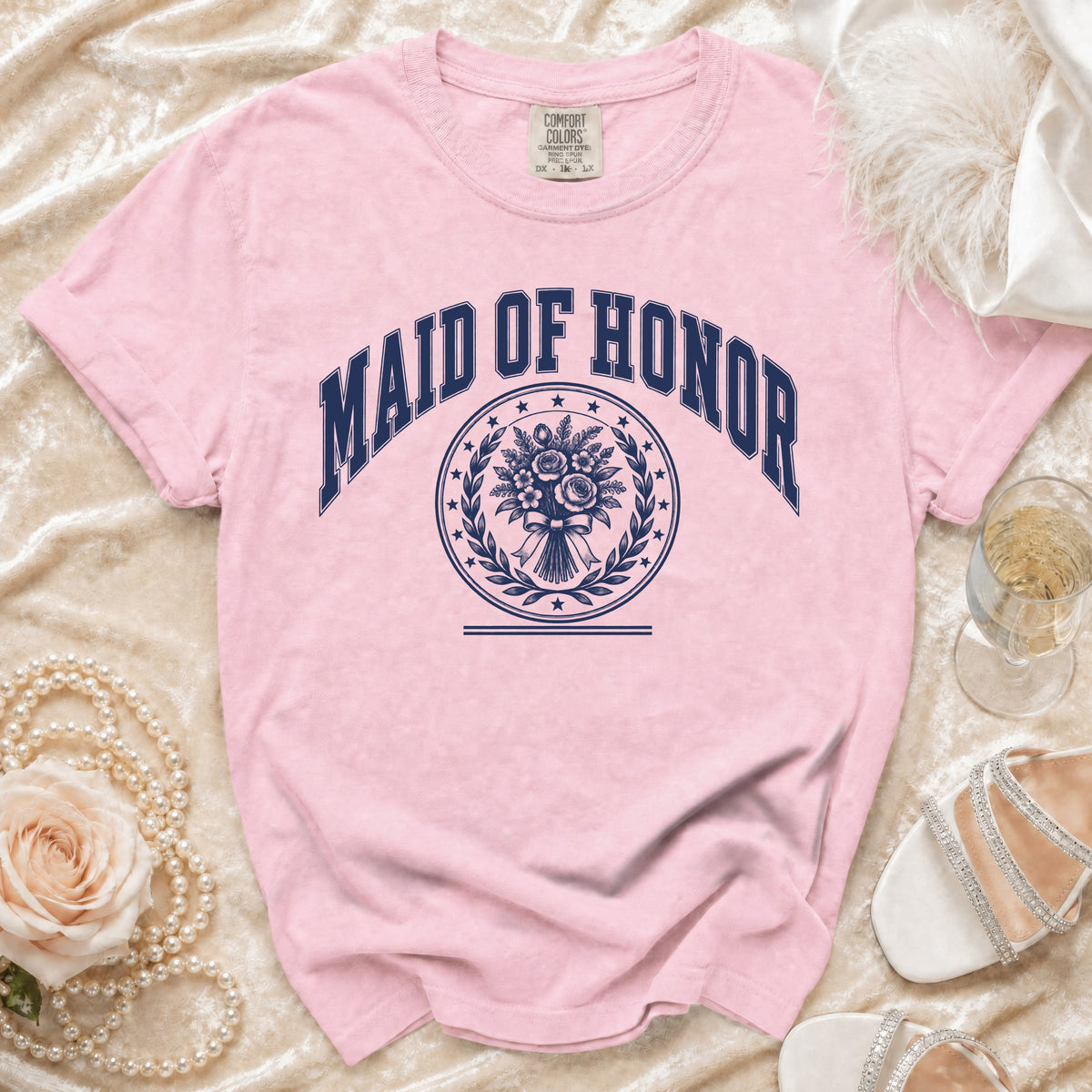Pink t-shirt with "Maid of Honor" and floral bouquet graphic.
