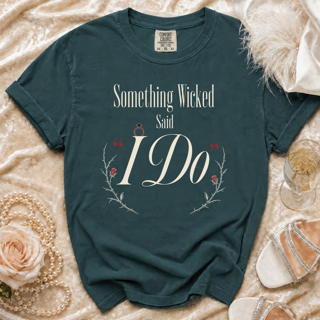 Teal t-shirt with "Something Wicked Said I Do" text and floral design.