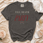 Dark grey t-shirt with "TILL DEATH DO US PARTY" text and wine glasses.