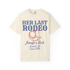 Cream t-shirt with "Her Last Rodeo" and cowboy boot graphic.
