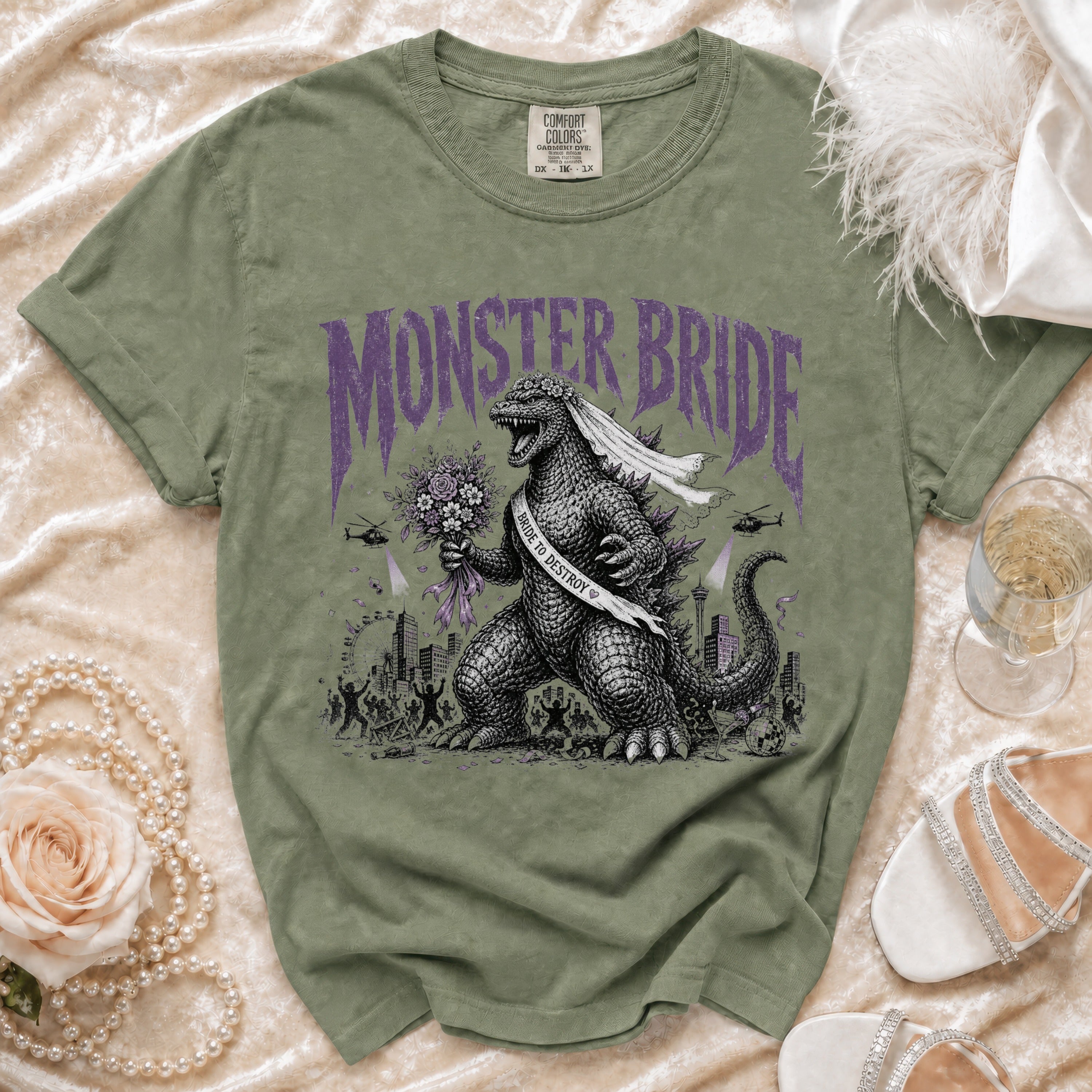 Green t-shirt with Godzilla wearing a veil and "Monster Bride" text.