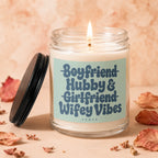 Candle with text "Boyfriend Hubby & Girlfriend Wifey Vibes".