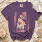 Purple t-shirt with ghost graphic saying "Scared Single Married to the Boo".