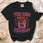 Black t-shirt with "This Bride Needs a Negroni" text and cocktail graphic.