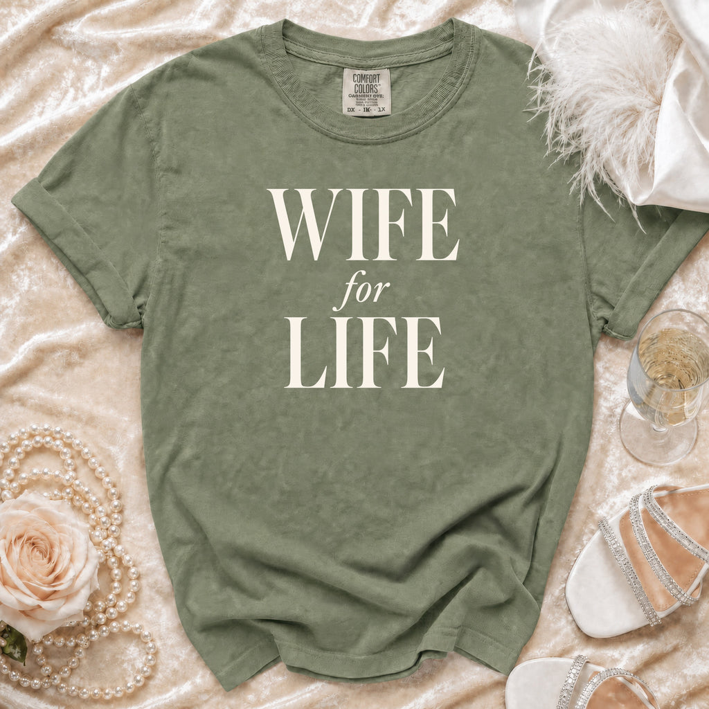 Green t-shirt with "WIFE for LIFE" text, pearls, rose, and champagne.
