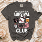Mother of the Bride Survival Club graphic tee with ghost, bag, coffee, and candle icons.