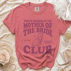 Pink "Mother of the Bride Club" t-shirt with "Est. 2026" and "#Emotional Support" details.