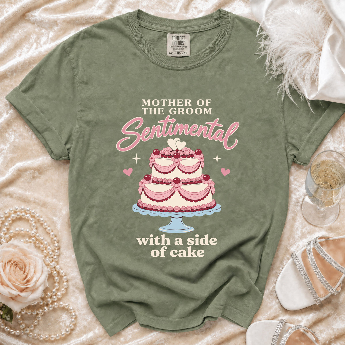 Green t-shirt with "Mother of the Groom Sentimental with a side of cake" text and cake graphic.