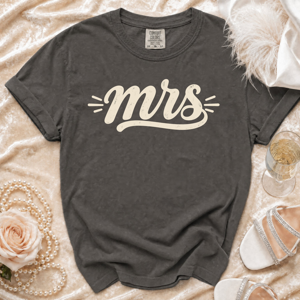 Dark grey t-shirt with cream "mrs" graphic, Comfort Colors tag.