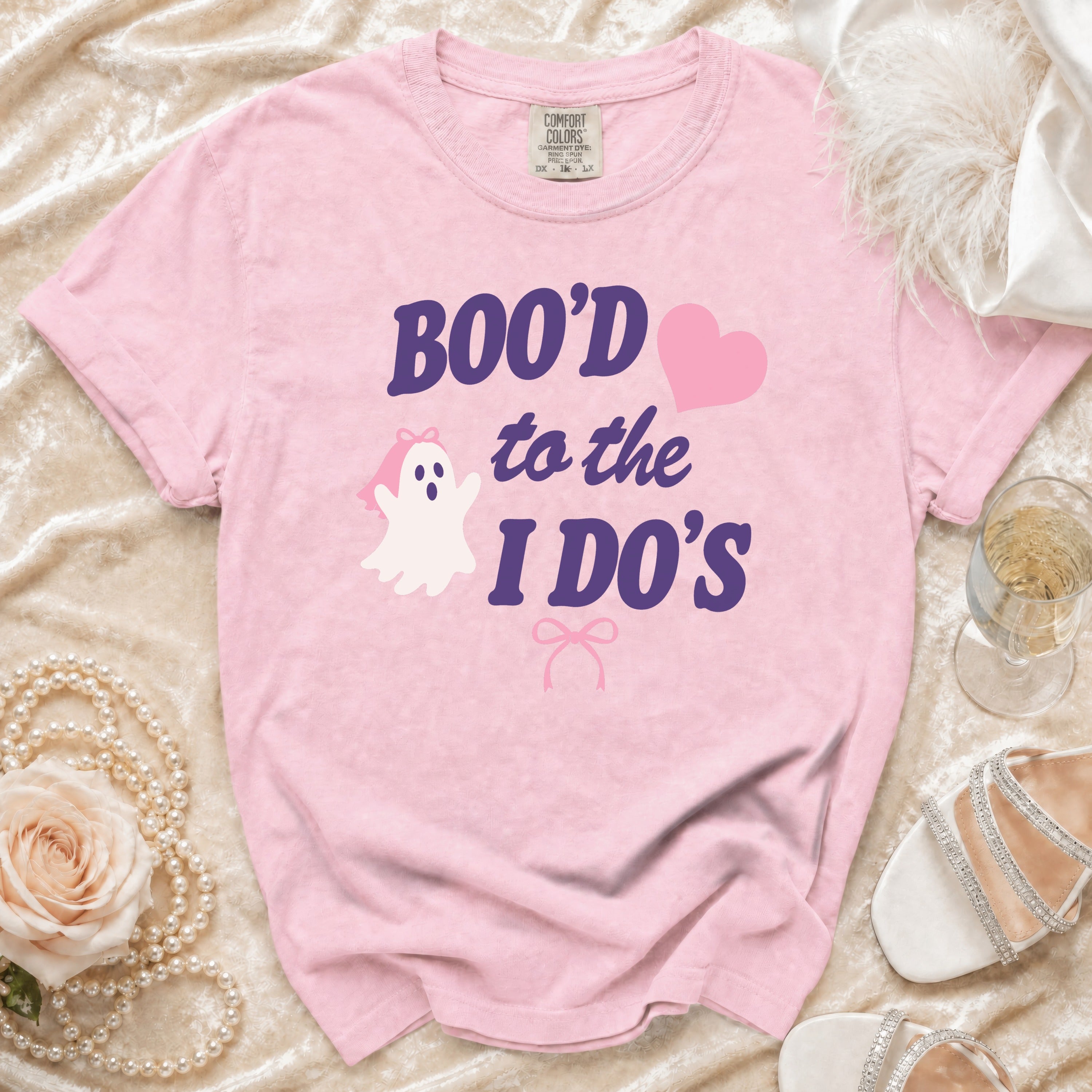 Pink t-shirt with ghost graphic and "Boo'd to the I Do's" text.