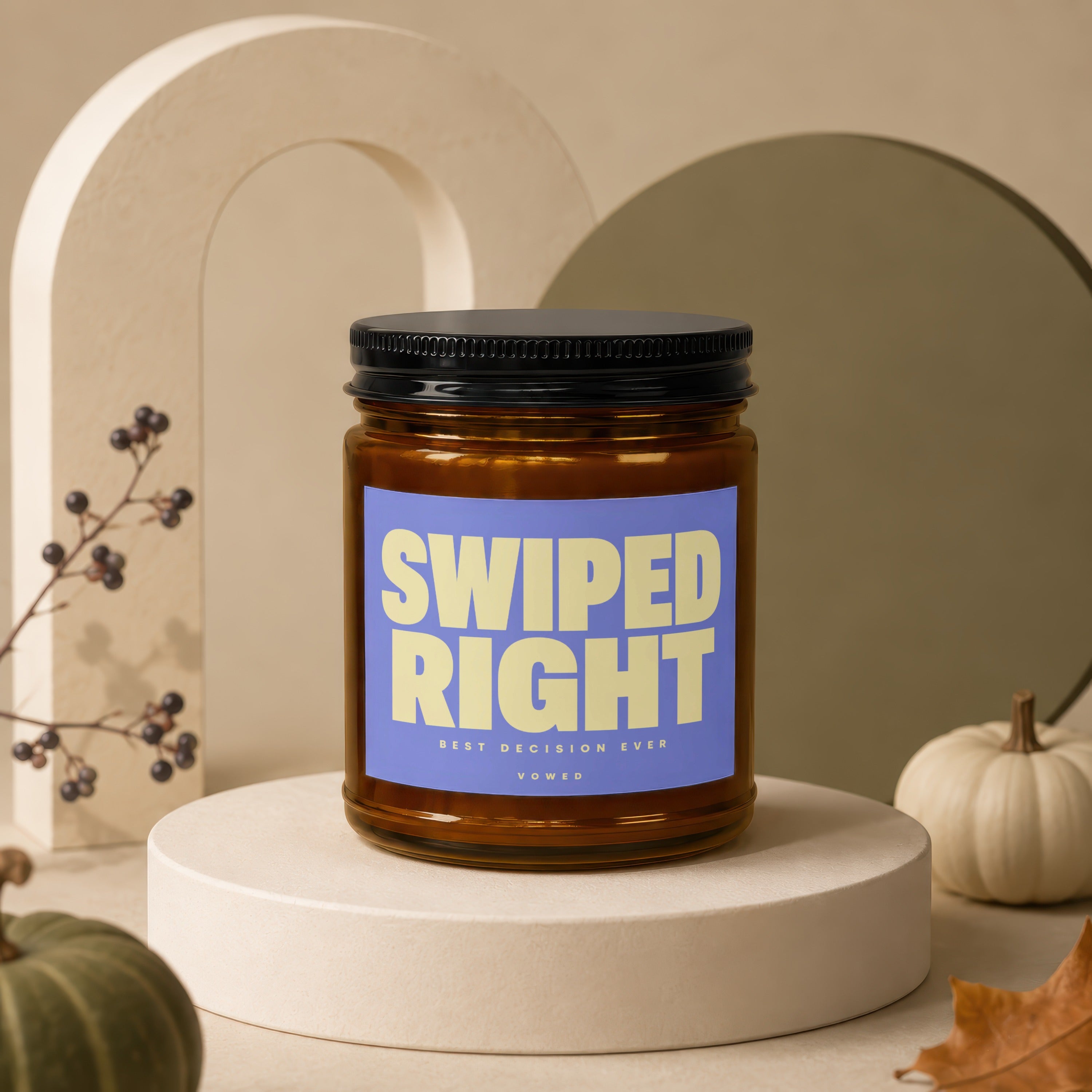 Amber candle with black lid, reads "SWIPED RIGHT BEST DECISION EVER VOWED".