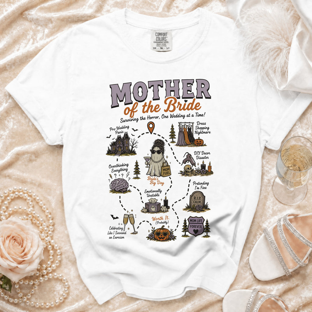 White t-shirt with "Mother of the Bride Surviving the Horror, One Wedding at a Time!" graphic.