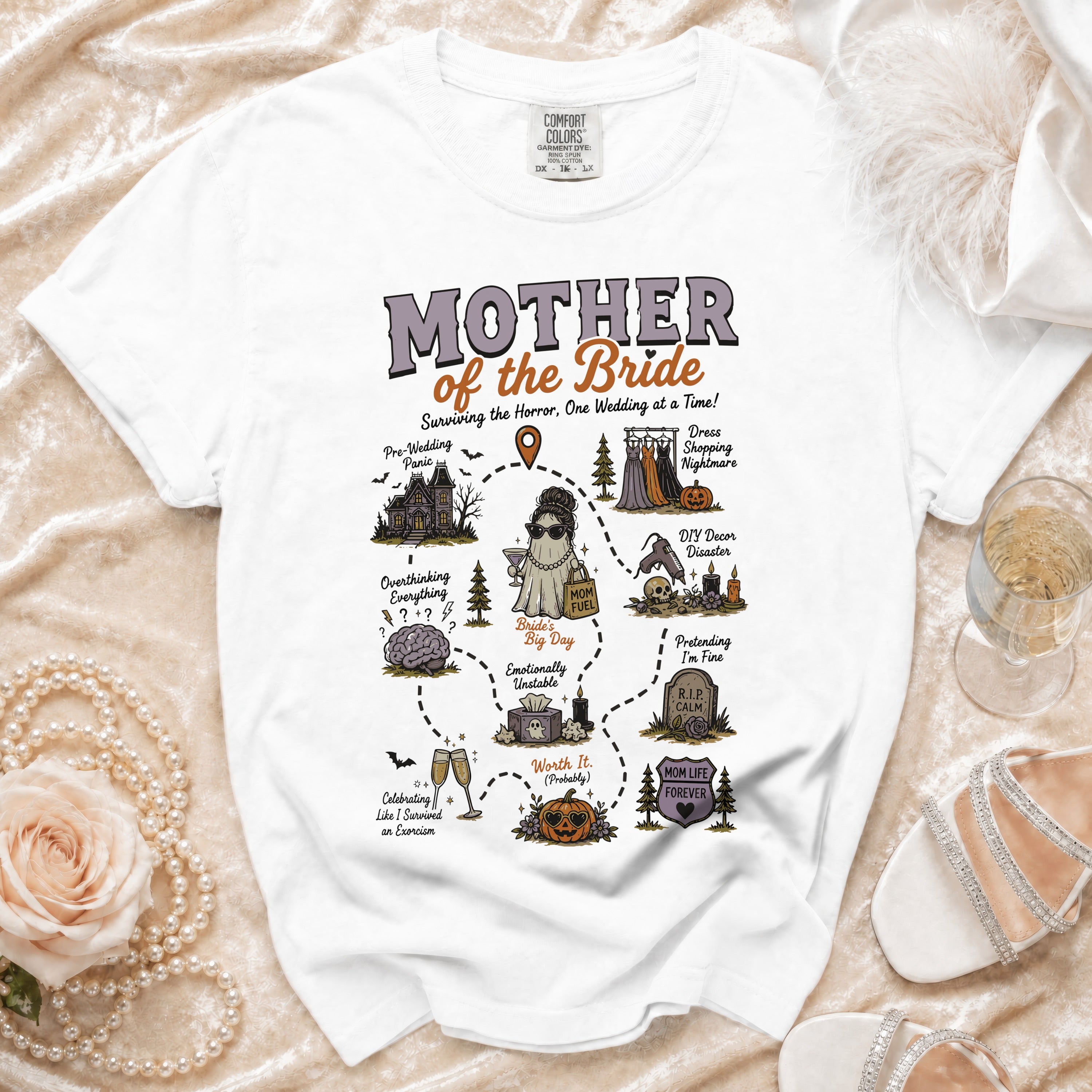 White t-shirt with "Mother of the Bride Surviving the Horror, One Wedding at a Time!" graphic.