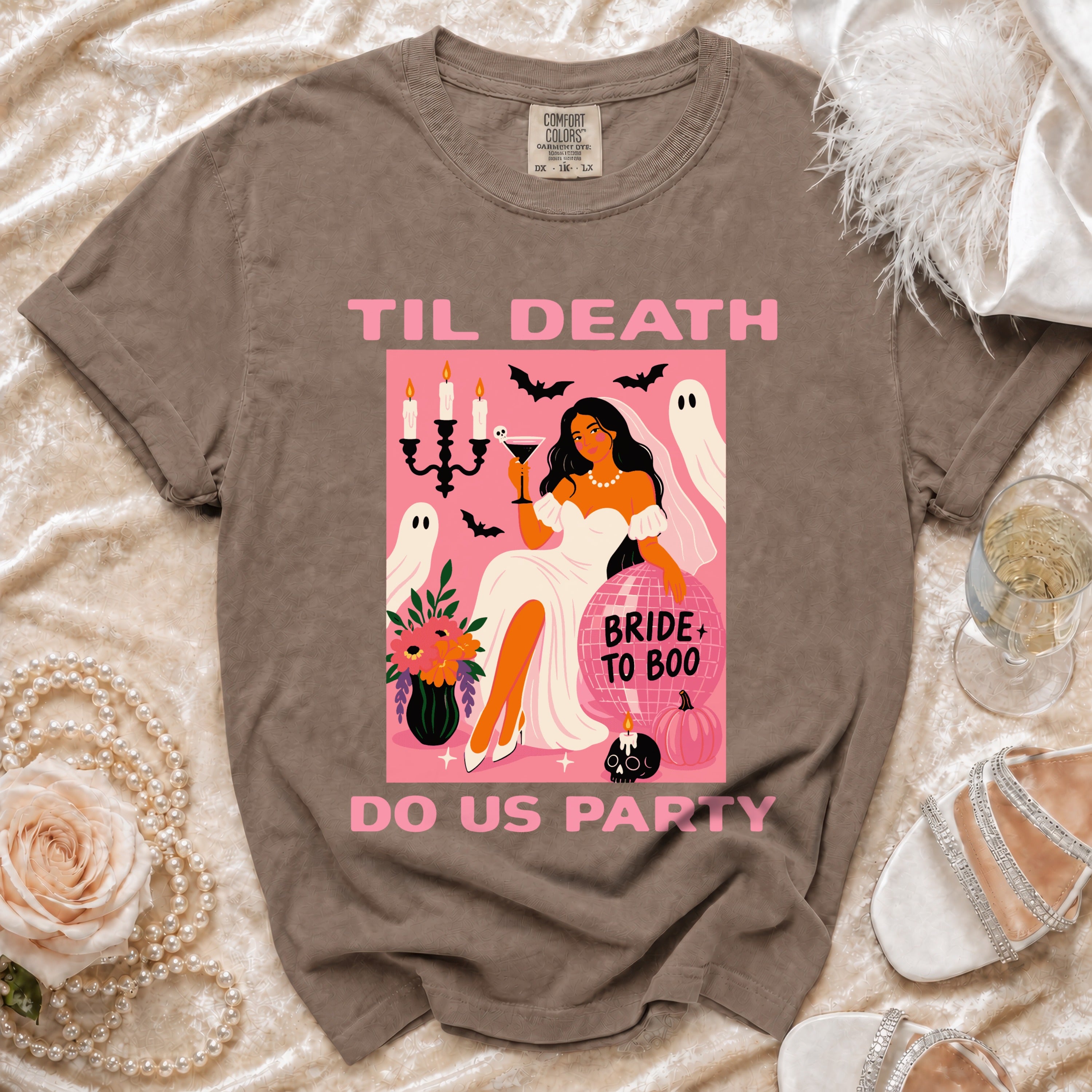 T-shirt with "Til Death Do Us Party" text and bride with ghosts graphic.