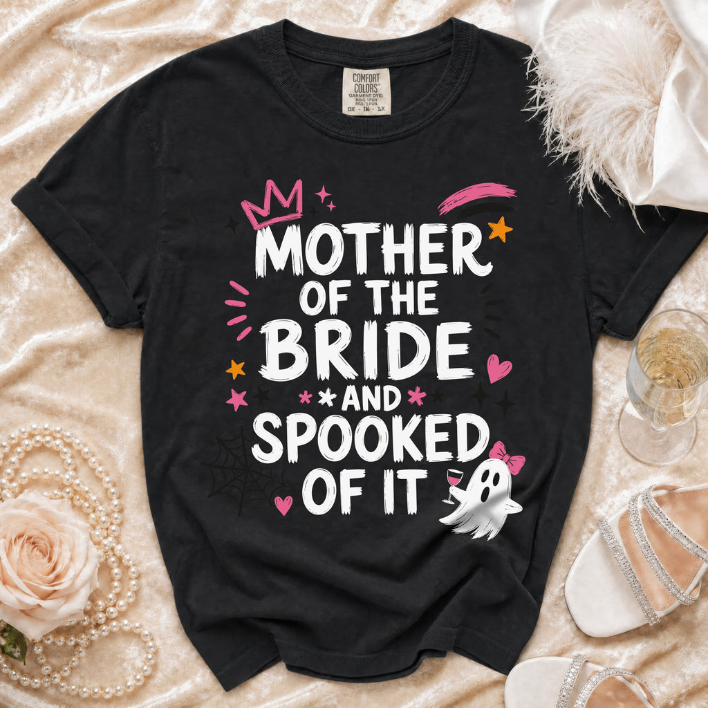 Black t-shirt with "Mother of the Bride and Spooked of It" Halloween graphic.