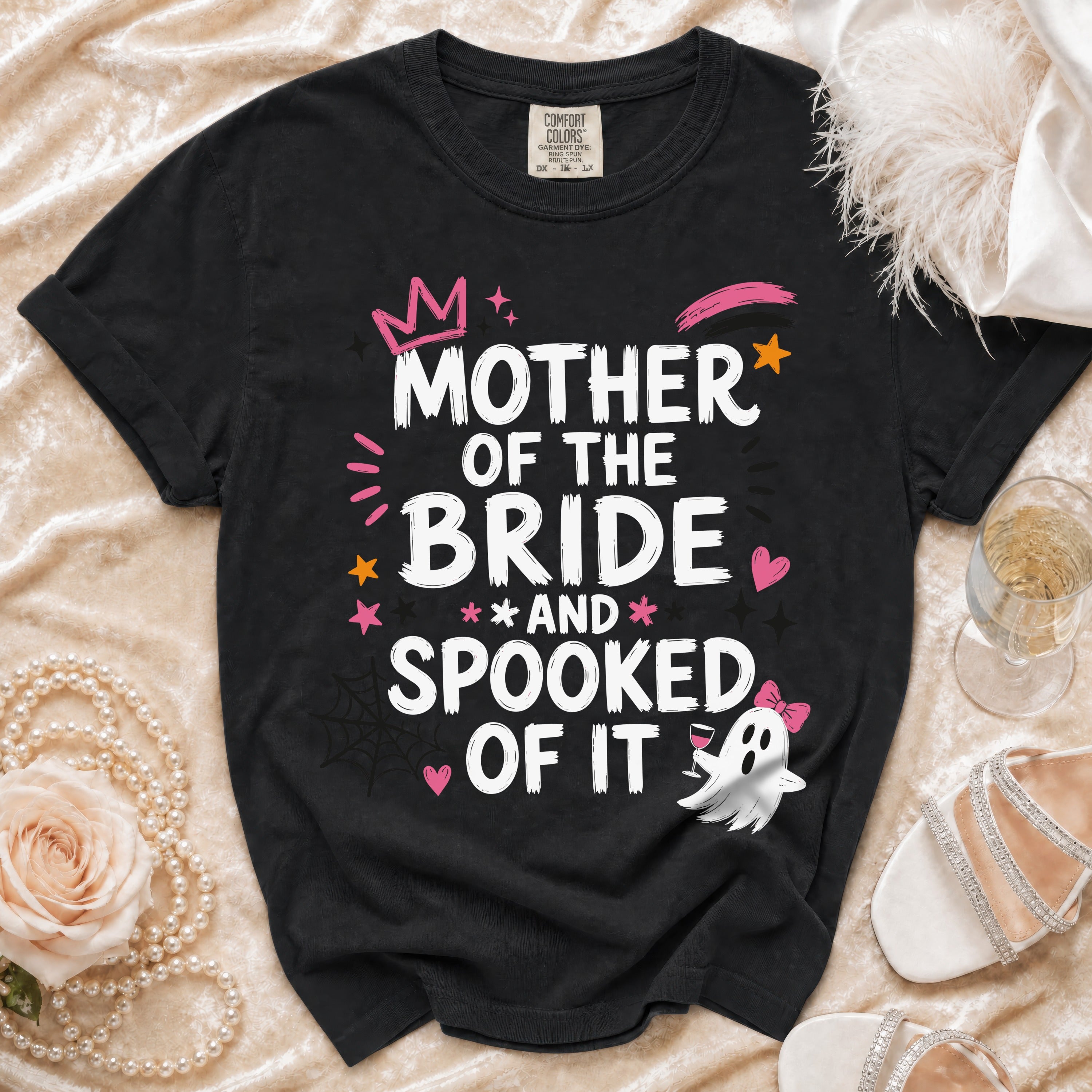 Black t-shirt with "Mother of the Bride and Spooked of It" Halloween graphic.