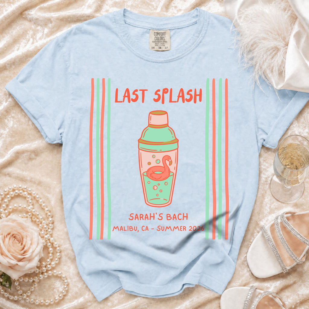 Light blue t-shirt with "Last Splash" and flamingo in shaker graphic.