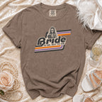 Brown t-shirt with skeleton bride graphic and text "Bride to be, not to die".