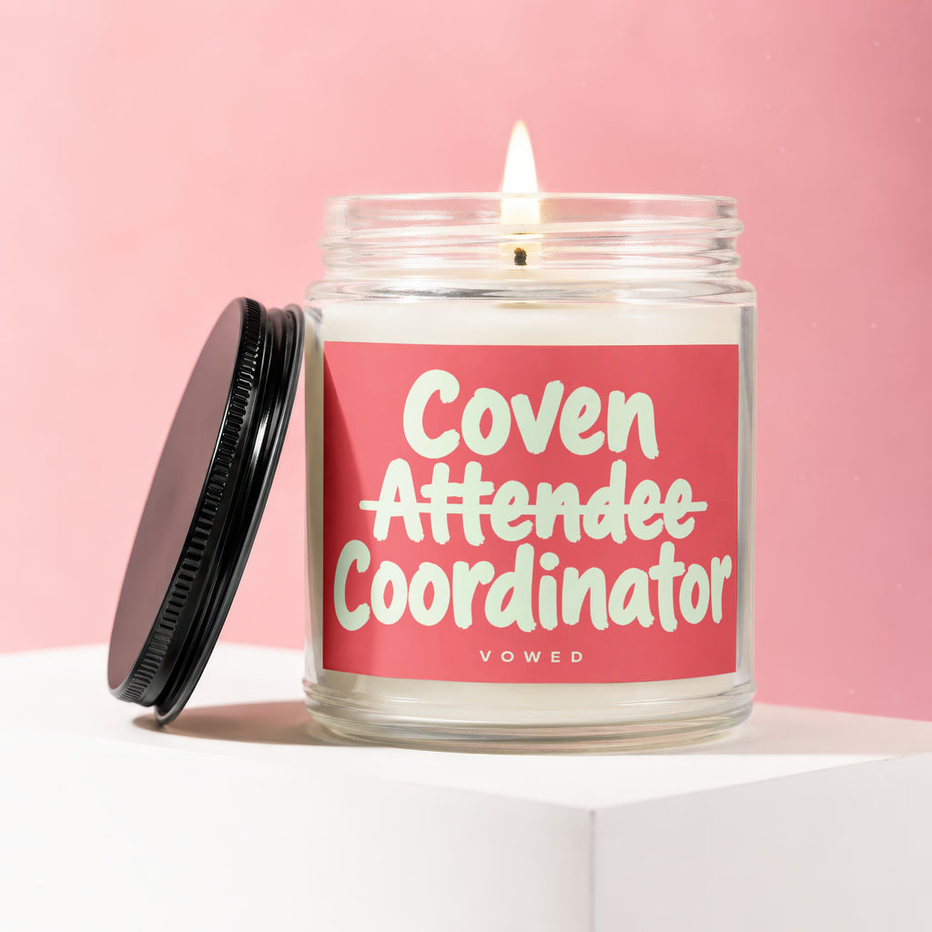 Scented candle that reads "Coven Attendee Coordinator" on vowed.