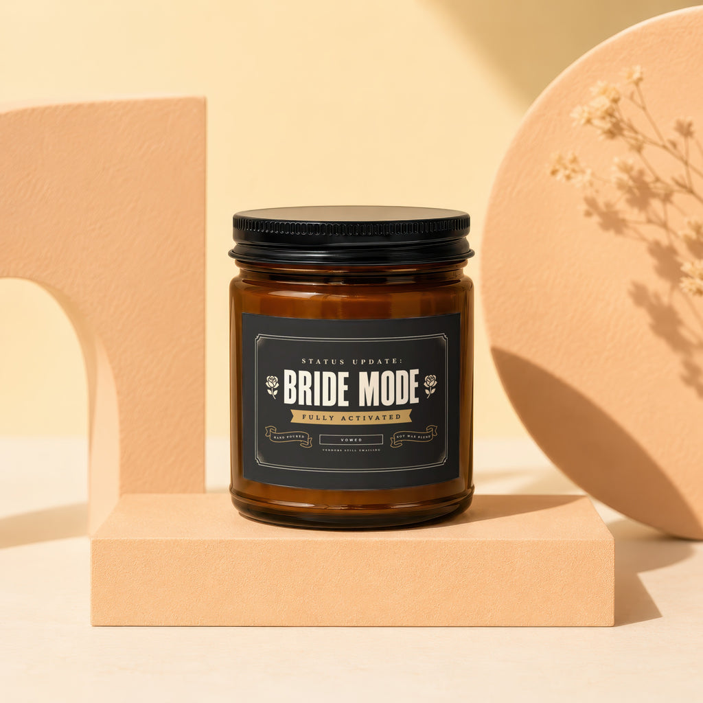 Amber jar candle with "Bride Mode Fully Activated" label, on a pedestal.