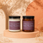 Two candles labeled "I Survived My Son's Wedding" with scent notes.