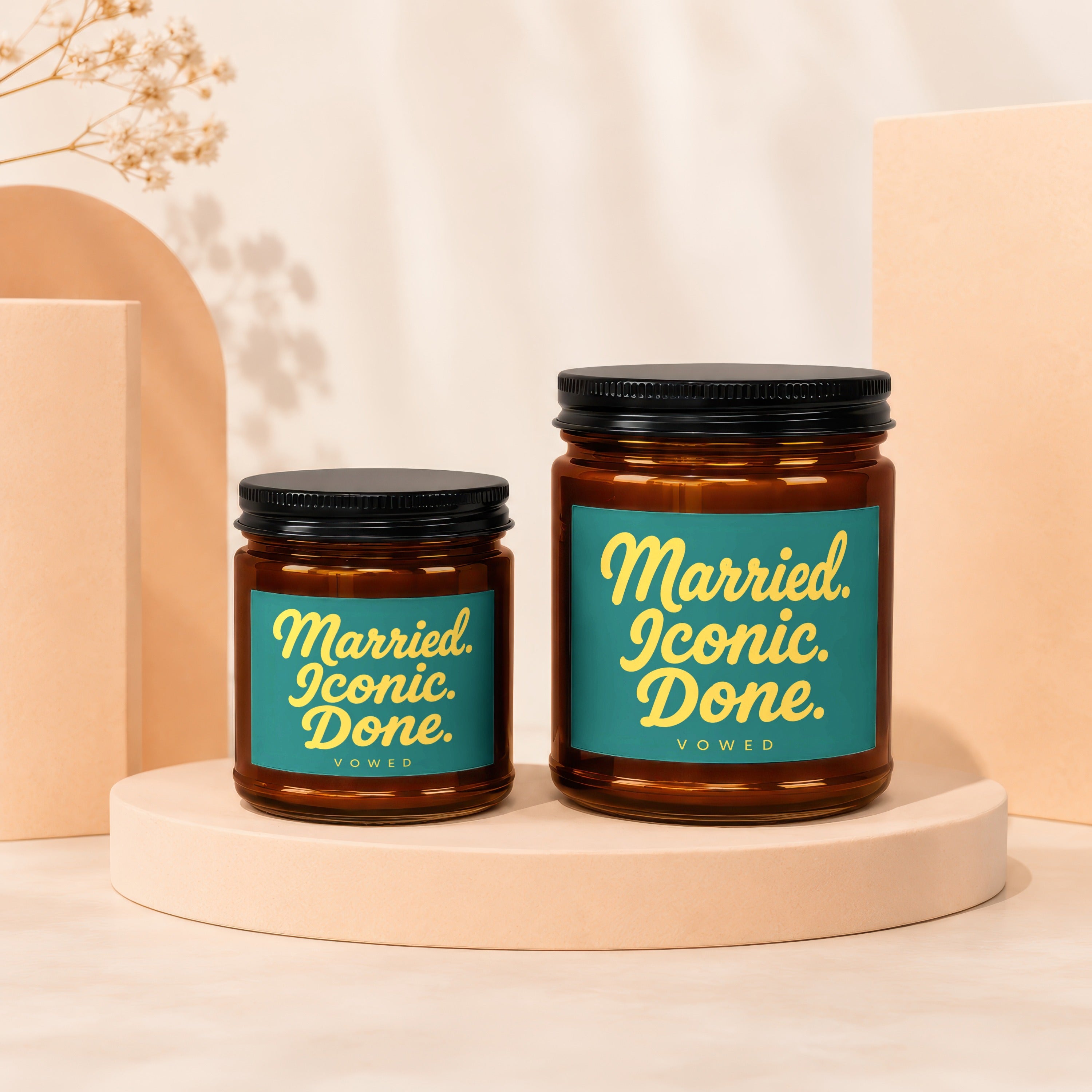 Two amber glass jars with teal labels reading "Married. Iconic. Done. VOWED".