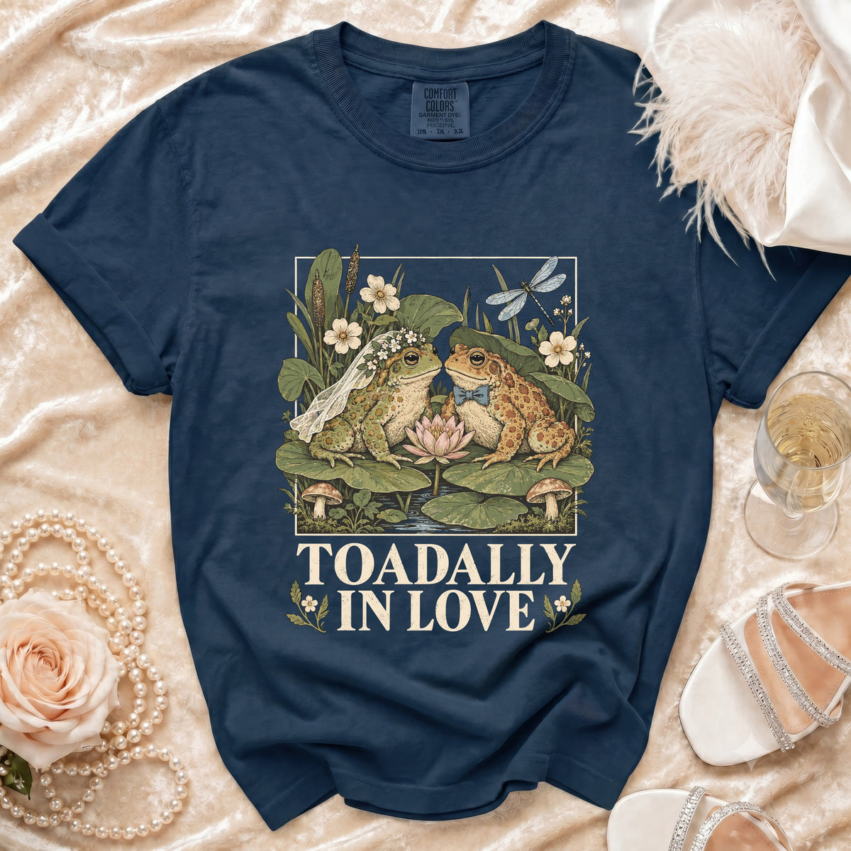 Navy t-shirt with wedding frogs graphic and text "TOADALLY IN LOVE".