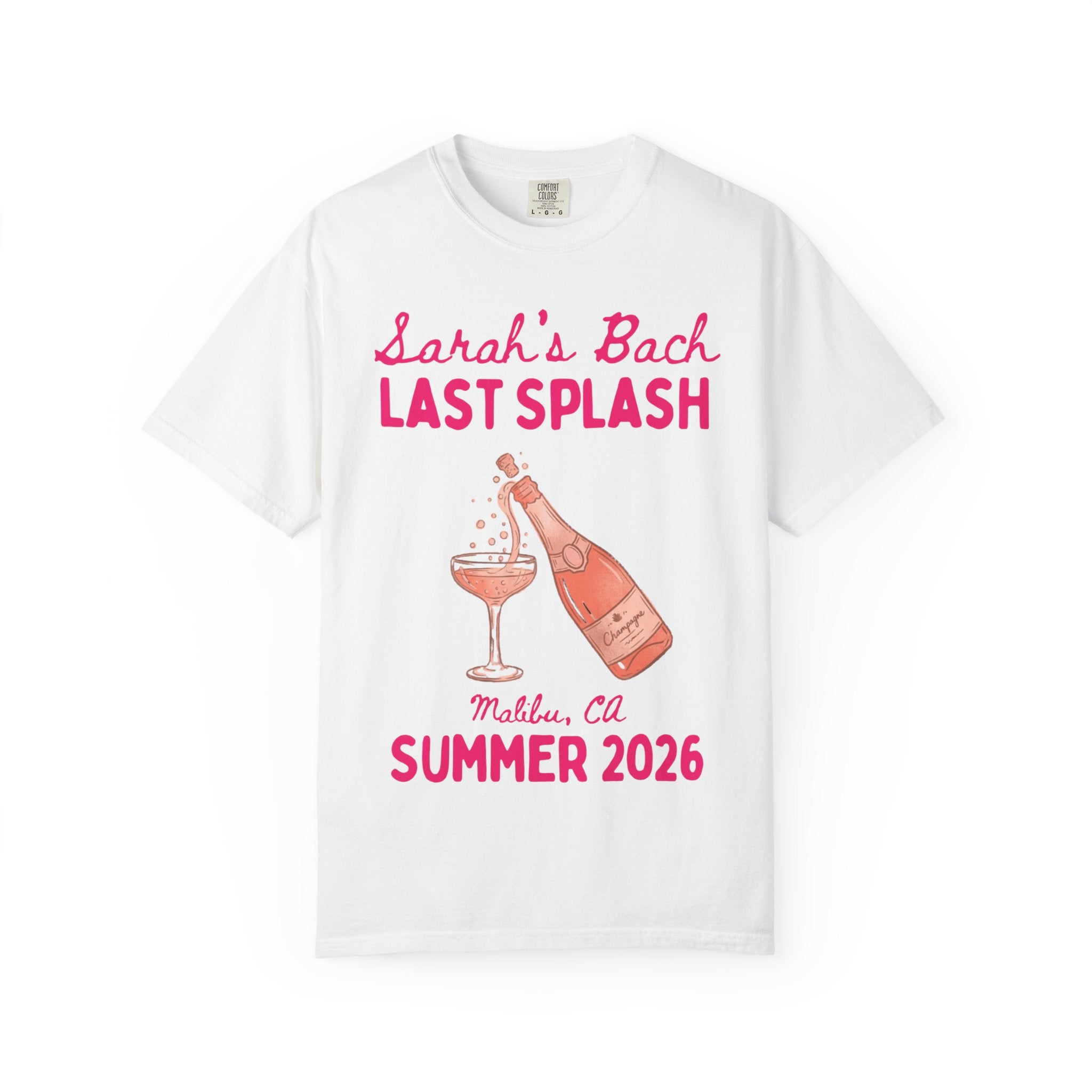 White t-shirt with pink text and champagne bottle graphic.